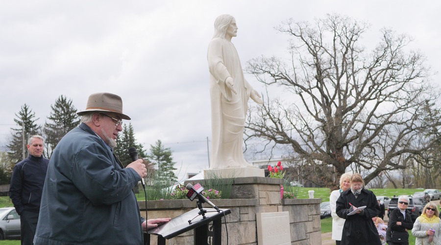Michael Berlinger addresses the media regarding marble statue restoration