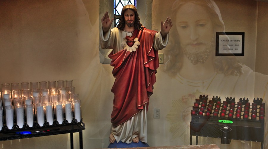 painting a sacred heart of jesus statue 
