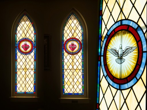 stained glass hearts and dove